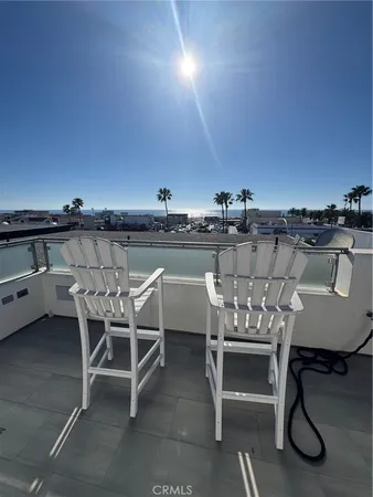 a view of a chairs and table on the terrace