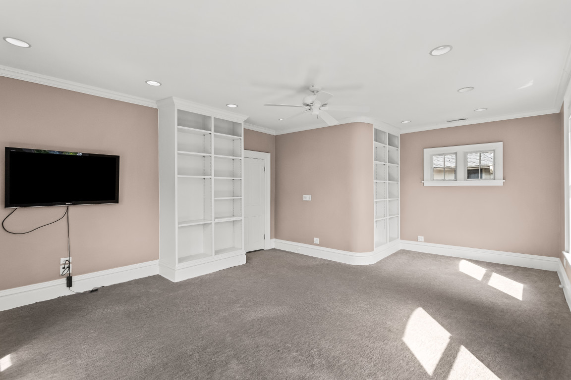 2236 Ridge Avenue Evanston, IL 60201 - Photo 39 of 68 a view of a livingroom with an empty space and a flat screen tv