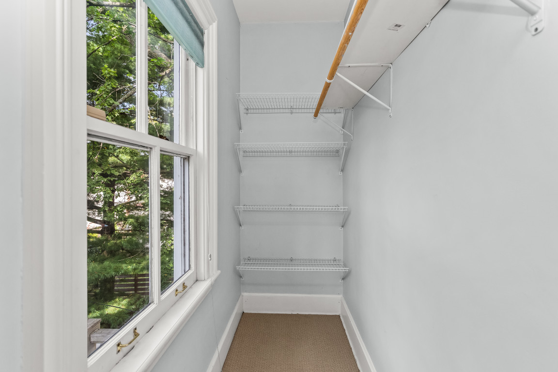 2236 Ridge Avenue Evanston, IL 60201 - Photo 45 of 68 a view of a room with rack on the wall and a window