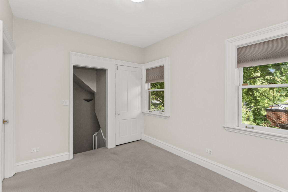 2236 Ridge Avenue Evanston, IL 60201 - Photo 47 of 68 an empty room with windows and closet
