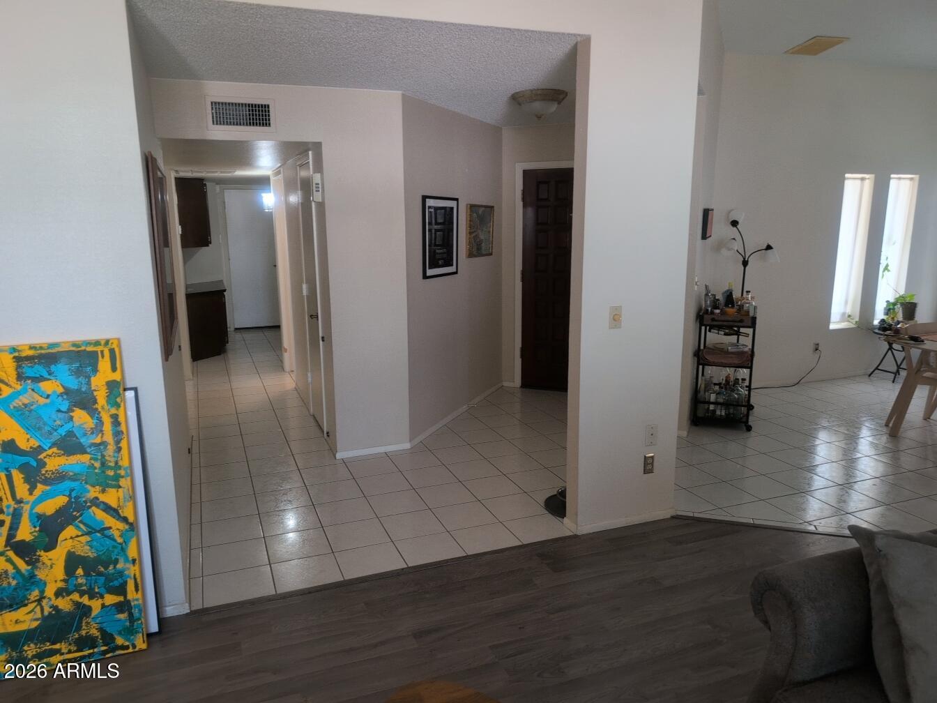 406 West Kings Avenue Phoenix, AZ 85023 - Photo 20 of 45 a view of hallway with furniture and wooden floor
