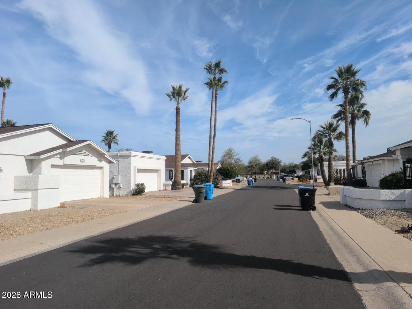 406 West Kings Avenue Phoenix, AZ 85023 - Photo 2 of 45 a view of a street with cars