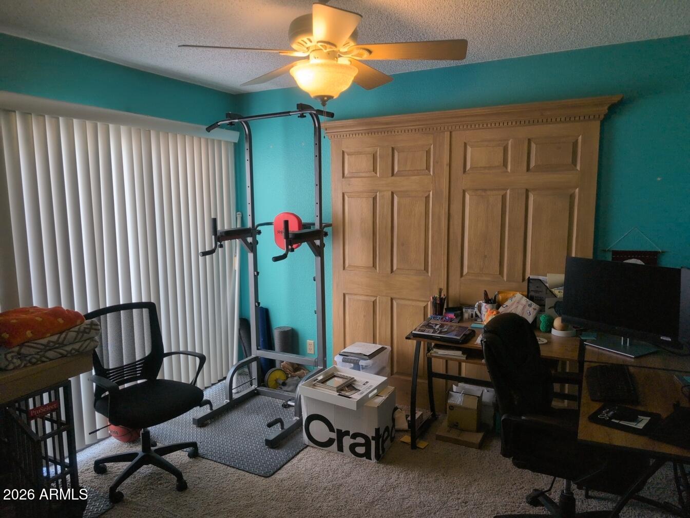 406 West Kings Avenue Phoenix, AZ 85023 - Photo 22 of 45 a view of a workspace with furniture and a window