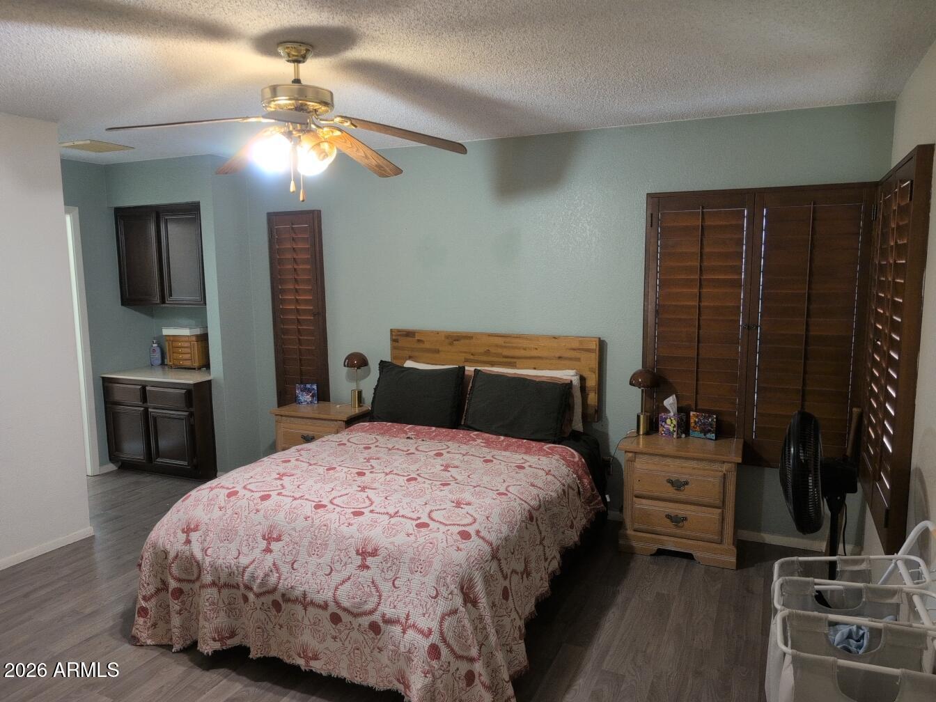 406 West Kings Avenue Phoenix, AZ 85023 - Photo 28 of 45 a bedroom with a bed and a chandelier
