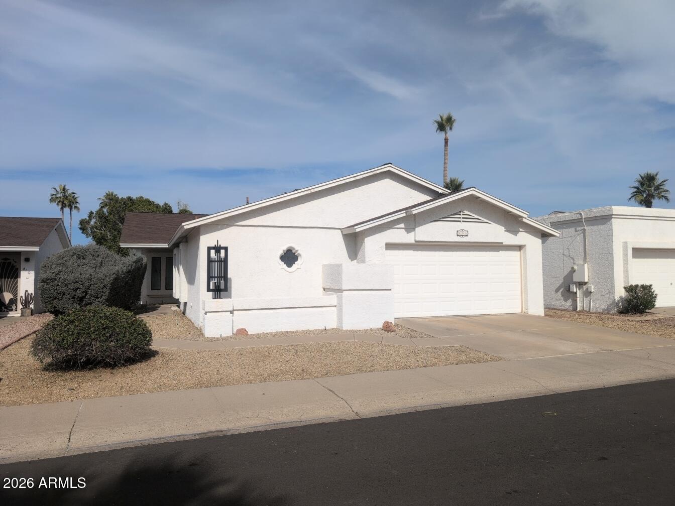 406 West Kings Avenue Phoenix, AZ 85023 - Photo 3 of 45 a view of a house with a street