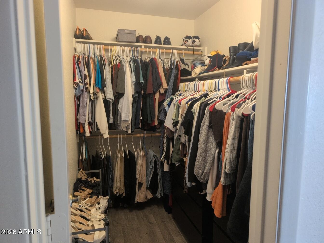 406 West Kings Avenue Phoenix, AZ 85023 - Photo 33 of 45 a view of walk in closet with clothes