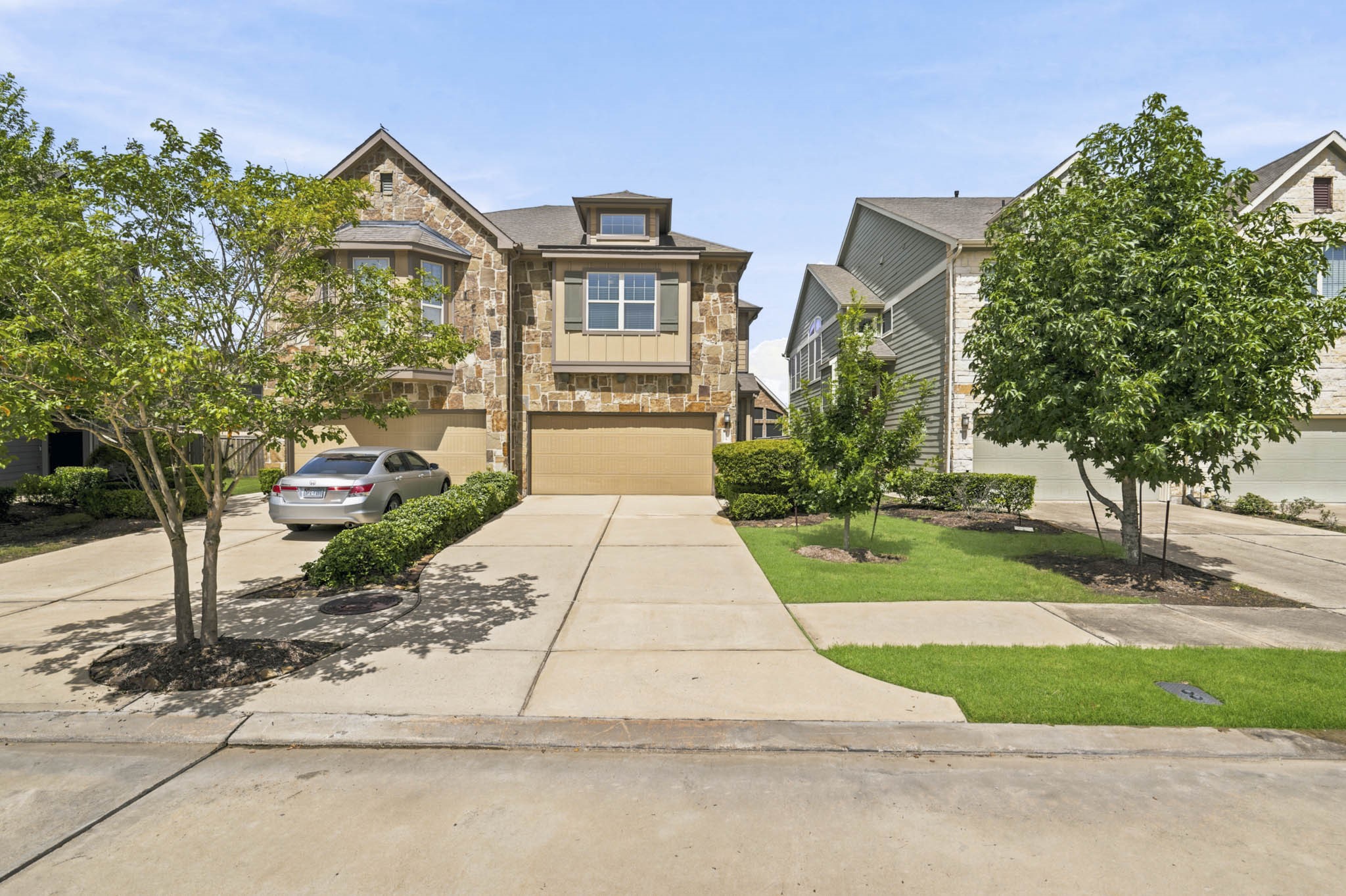 12115 San Luca Street Richmond, TX 77406 - Photo 2 of 44 Welcome home to a striking stone-and-siding exterior that blends timeless charm with modern appeal. Thoughtfully landscaped and impeccably maintained, this home makes a memorable first impression from the moment you arrive.