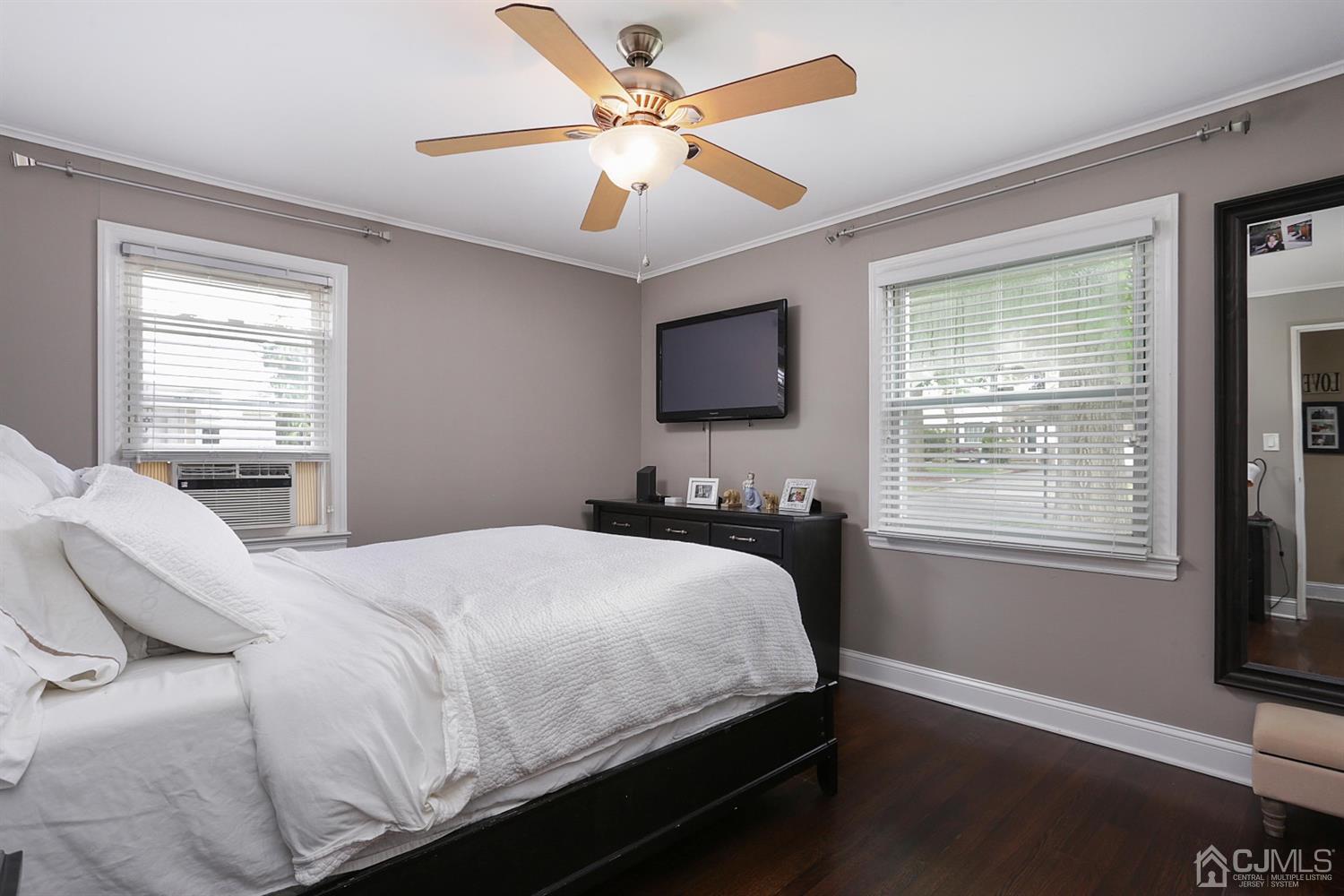 39 West Hill Road Colonia, NJ 07067 - Photo 18 of 26 a bedroom with a bed next to a window