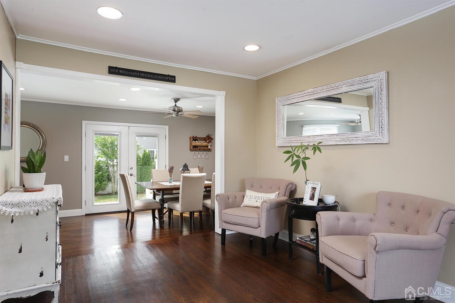 39 West Hill Road Colonia, NJ 07067 - Photo 7 of 26 a living room with furniture and wooden floor