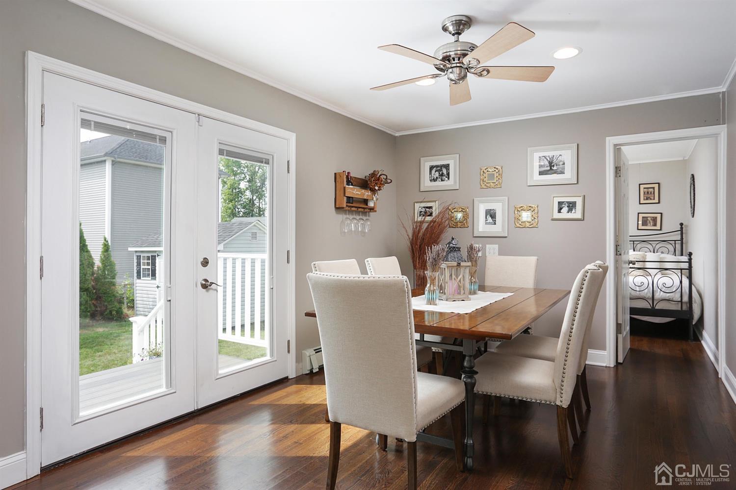 39 West Hill Road Colonia, NJ 07067 - Photo 9 of 26 a dining room with furniture window wooden floor