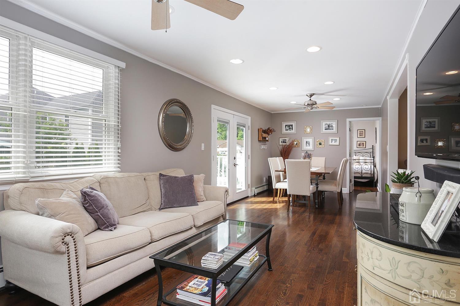 39 West Hill Road Colonia, NJ 07067 - Photo 10 of 26 a living room with furniture and a large window