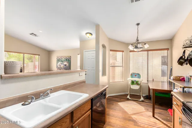 a spacious bathroom with a sink double vanity and a bathtub