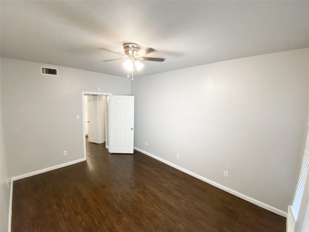 2529 Rio Grande Street, Unit 34 Austin, TX 78705 - Photo 9 of 17 wooden floor in an empty room