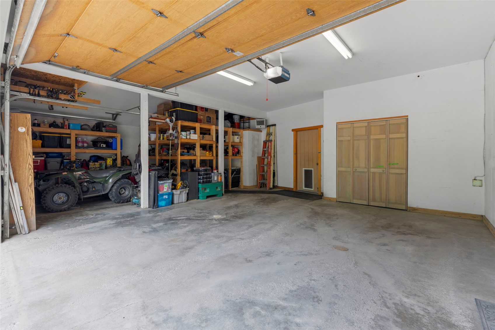 1516 Blue Ridge Road Silverthorne, CO 80498 - Photo 44 of 50 Garage featuring a garage door opener