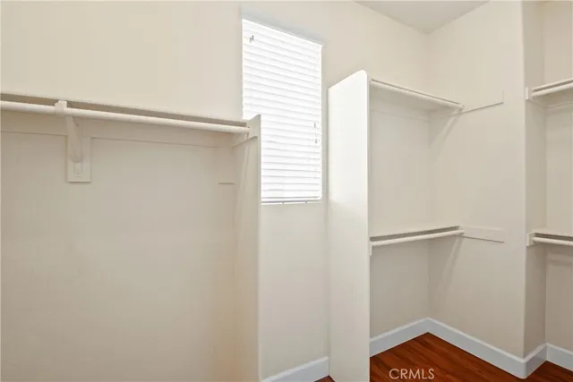a view of an empty walk in closet