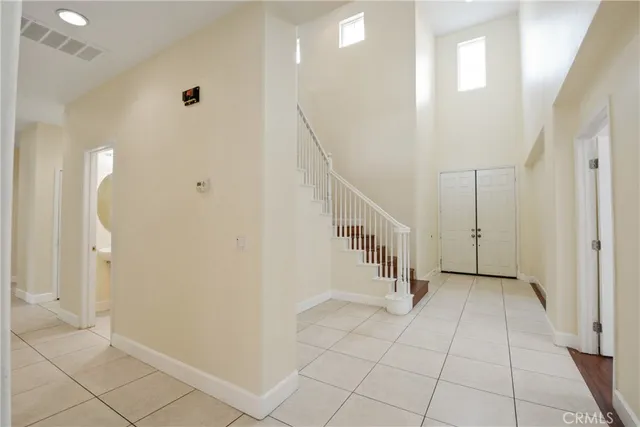 a view of an entryway with stairs