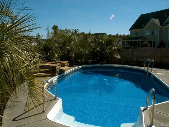 306 Challenge Road Raleigh, NC 27603 - Photo 11 of 12 Your own private pool with stone waterfall Swimming Pool/Hot Tub/Sauna
