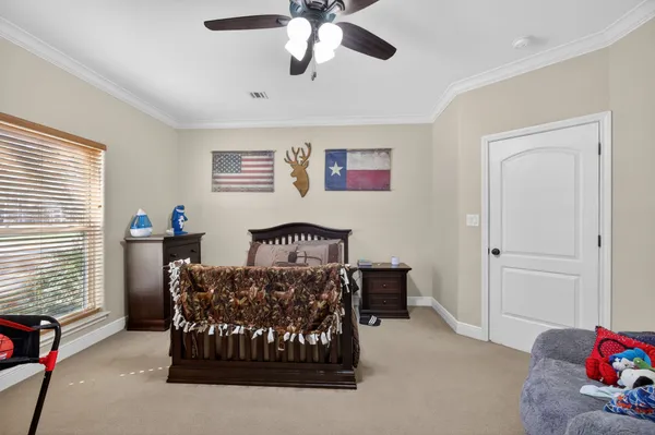 a bed room with furniture and a window