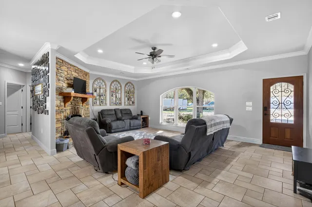 a living room with furniture and a window
