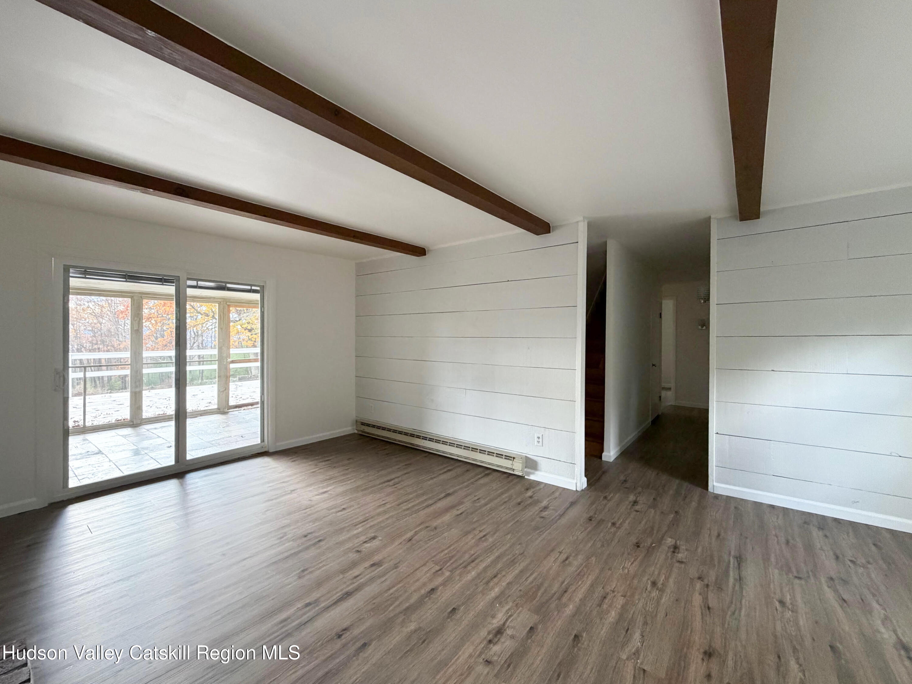 13 Heyden Road Shokan, NY 12481 - Photo 18 of 37 a view of an empty room with wooden floor and a window