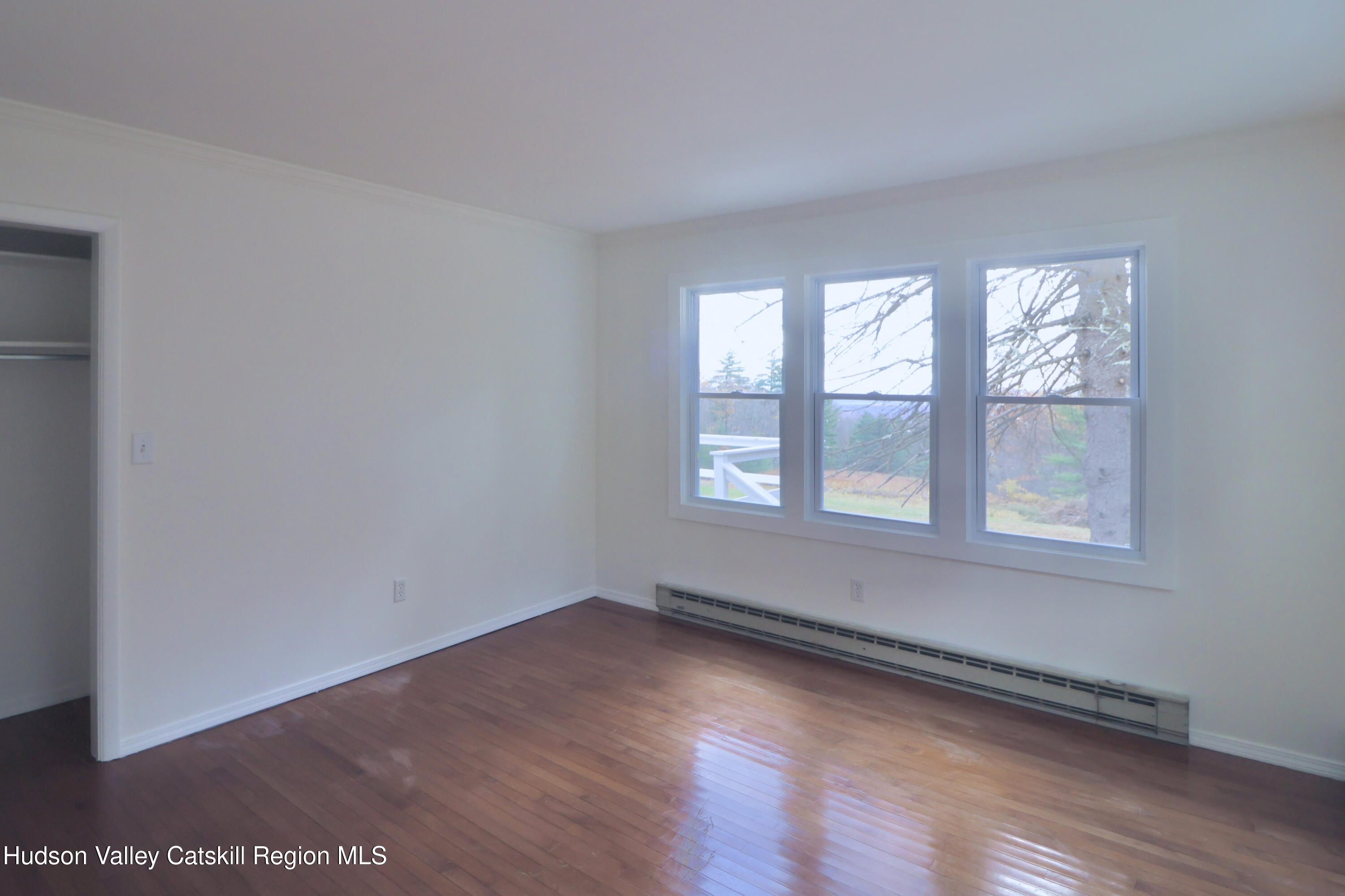 13 Heyden Road Shokan, NY 12481 - Photo 21 of 37 an empty room with wooden floor and windows