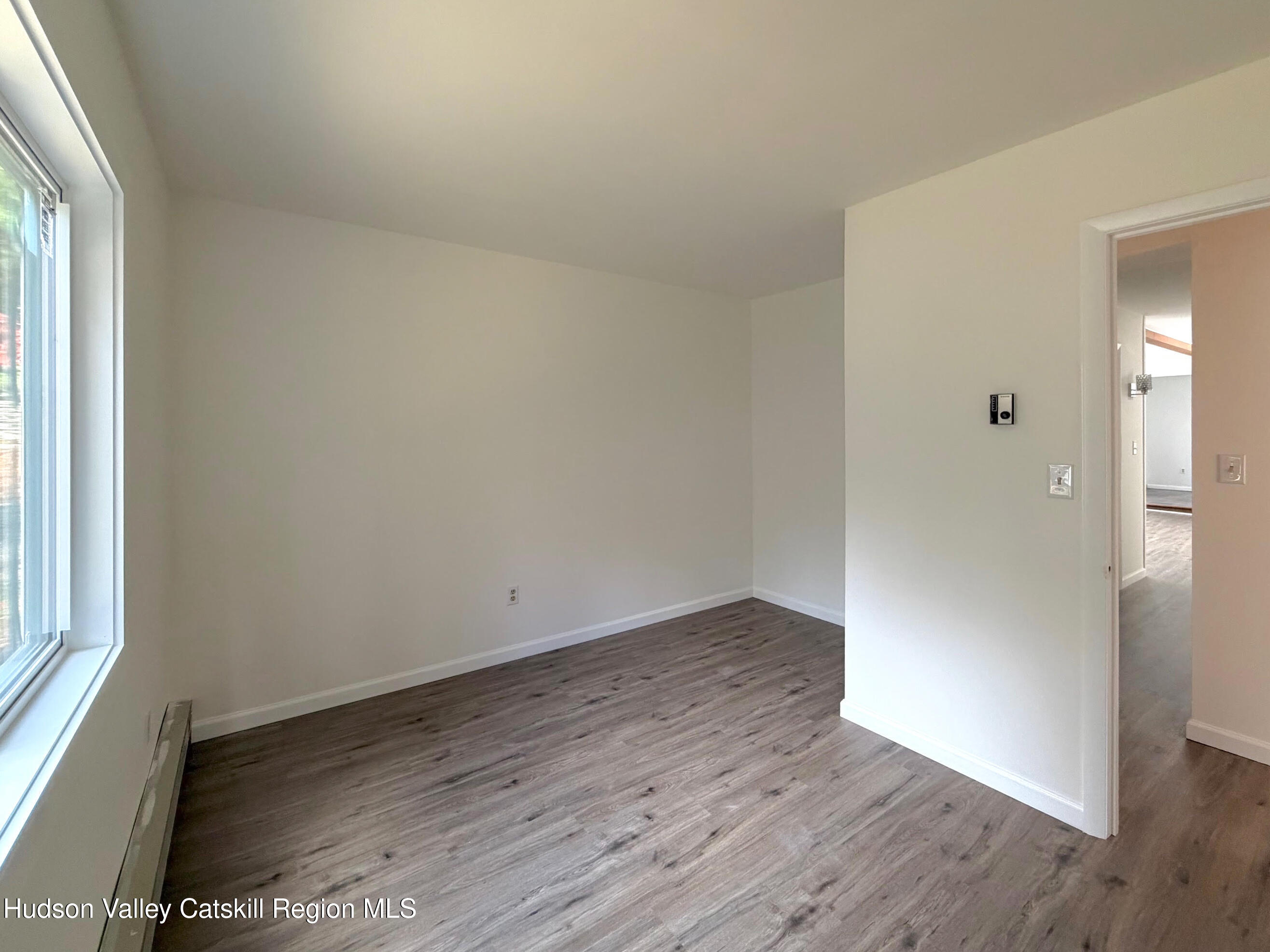 13 Heyden Road Shokan, NY 12481 - Photo 24 of 37 an empty room with wooden floor and windows