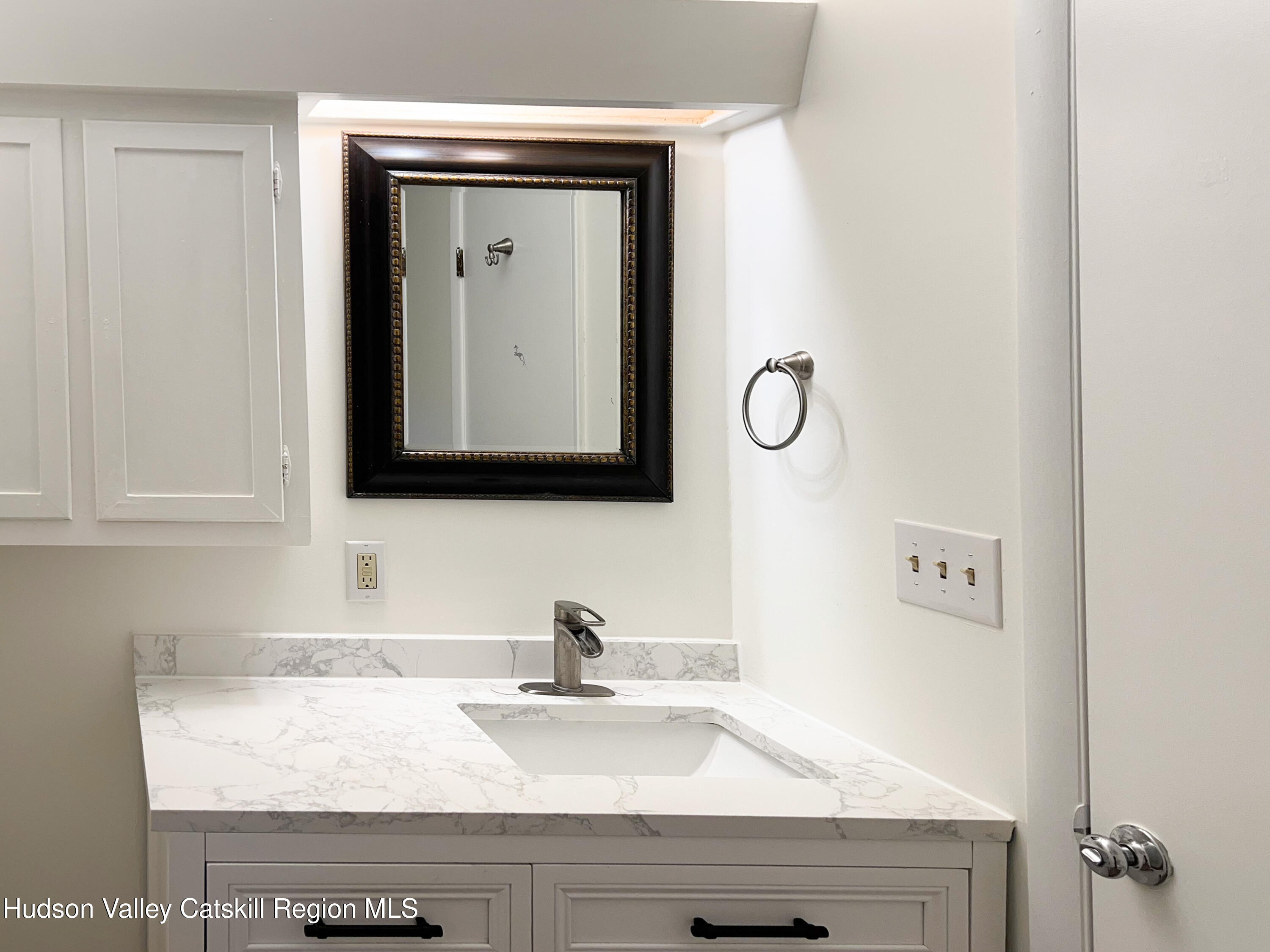 13 Heyden Road Shokan, NY 12481 - Photo 25 of 37 a bathroom with a granite countertop sink and a mirror