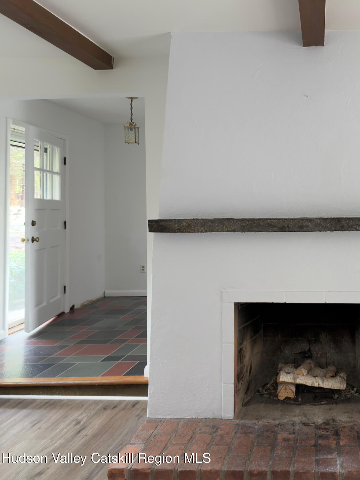 13 Heyden Road Shokan, NY 12481 - Photo 32 of 37 a living room with furniture and a potted plant