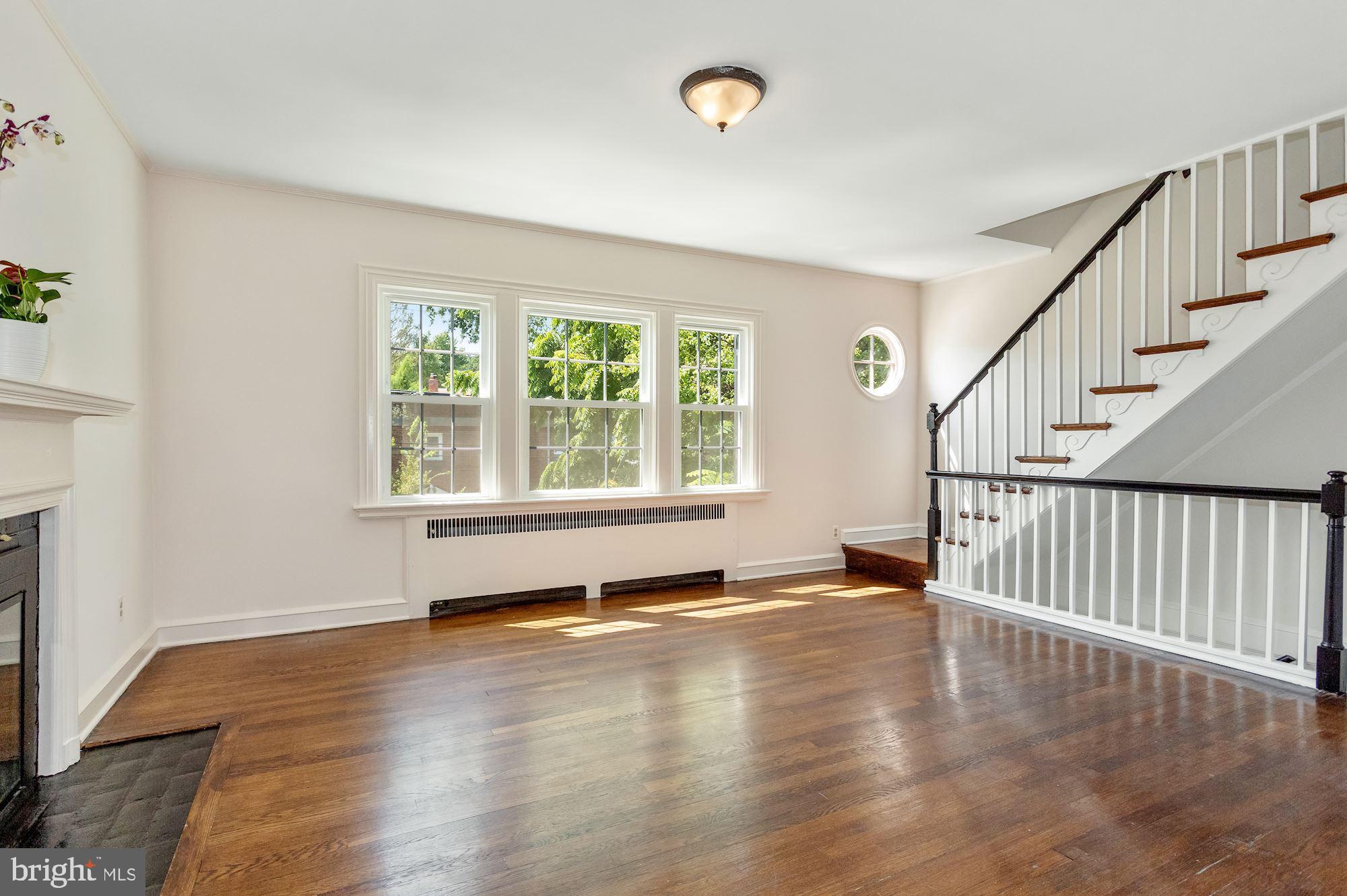 2121 Tunlaw Road Northwest Washington, DC 20007 - Photo 3 of 35 Living Room with Fireplace