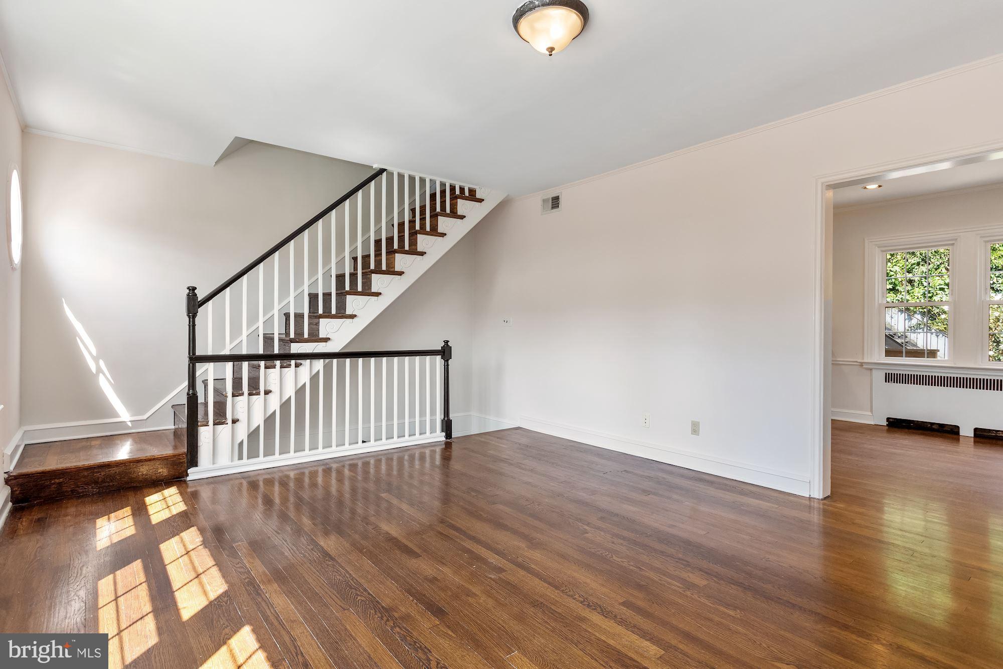 2121 Tunlaw Road Northwest Washington, DC 20007 - Photo 4 of 35 Living Room with Fireplace