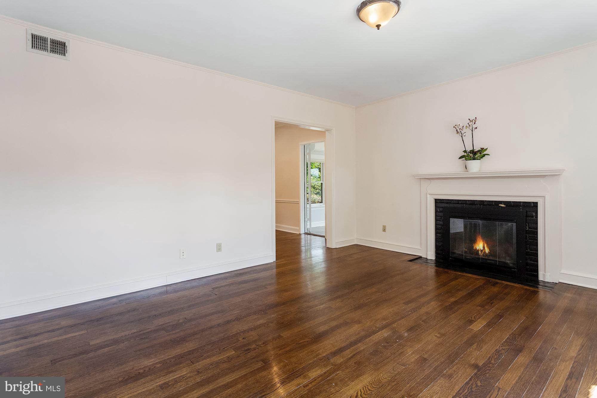 2121 Tunlaw Road Northwest Washington, DC 20007 - Photo 5 of 35 Living Room with Fireplace