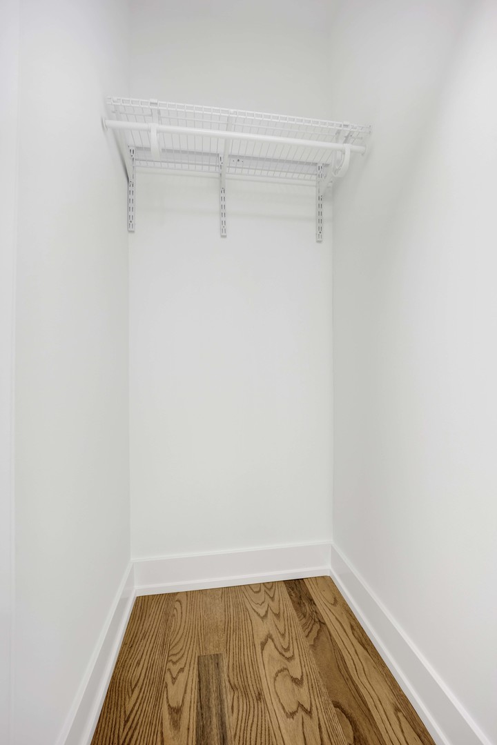 3300 West Pershing Road, Unit 3R Chicago, IL 60632 - Photo 11 of 11 a view of a room with wooden floor