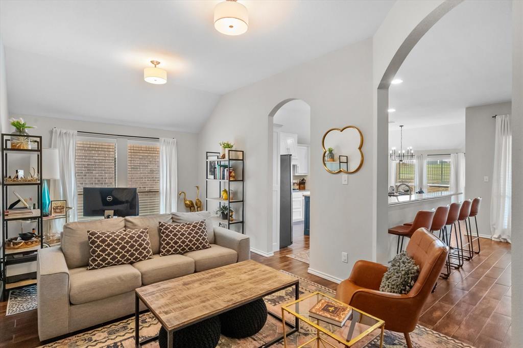 7224 Prestwick Terrace Benbrook, TX 76126 - Photo 18 of 39 a living room with furniture a fireplace and a window