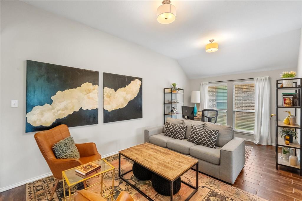7224 Prestwick Terrace Benbrook, TX 76126 - Photo 19 of 39 a living room with furniture and wooden floor