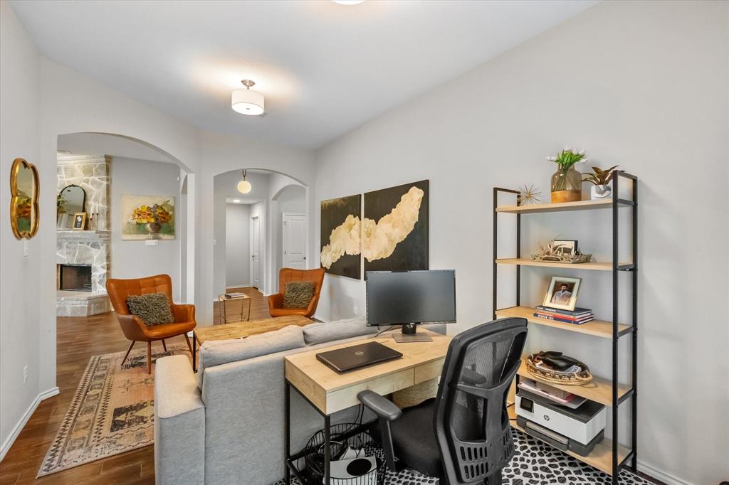 7224 Prestwick Terrace Benbrook, TX 76126 - Photo 20 of 39 a living room with furniture and a flat screen tv
