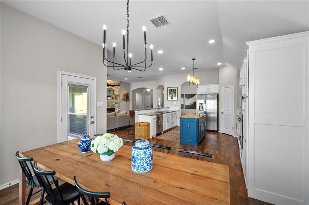 7224 Prestwick Terrace Benbrook, TX 76126 - Photo 24 of 39 a kitchen with a table and chairs