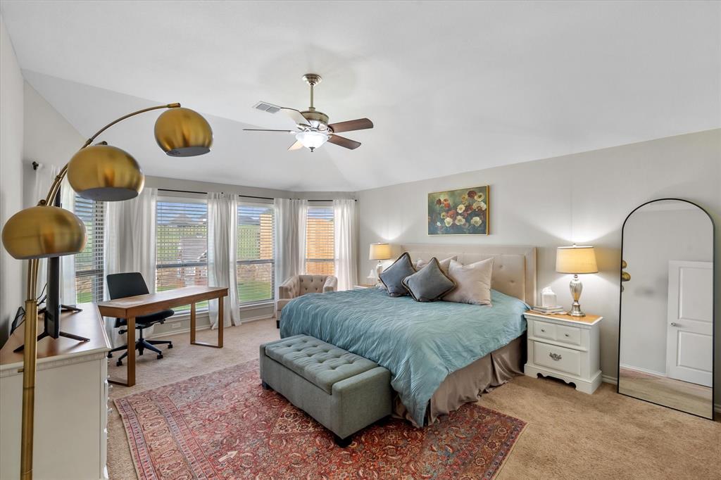 7224 Prestwick Terrace Benbrook, TX 76126 - Photo 25 of 39 a bedroom with a bed mirror and window
