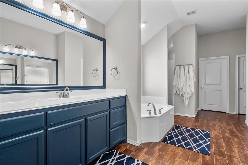 7224 Prestwick Terrace Benbrook, TX 76126 - Photo 28 of 39 a bathroom with a sink and a mirror