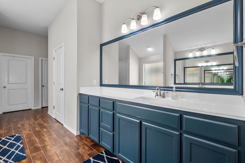 7224 Prestwick Terrace Benbrook, TX 76126 - Photo 29 of 39 a spacious bathroom with a double vanity sink and a mirror