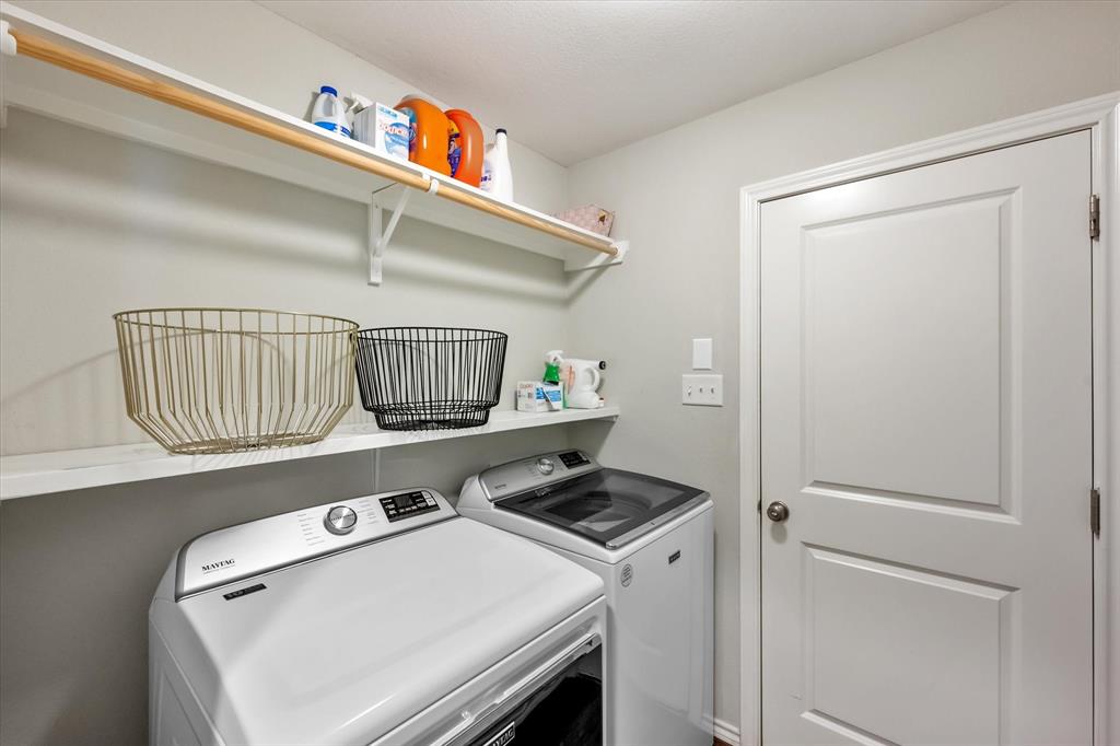 7224 Prestwick Terrace Benbrook, TX 76126 - Photo 35 of 39 a utility room with dryer and washer