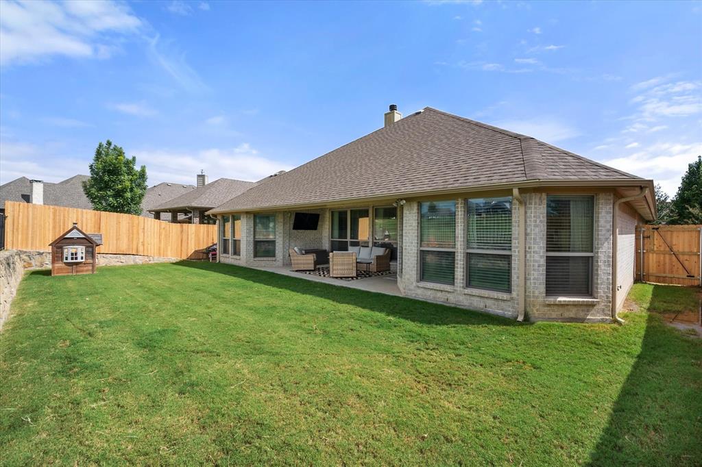 7224 Prestwick Terrace Benbrook, TX 76126 - Photo 38 of 39 a view of a house with a yard