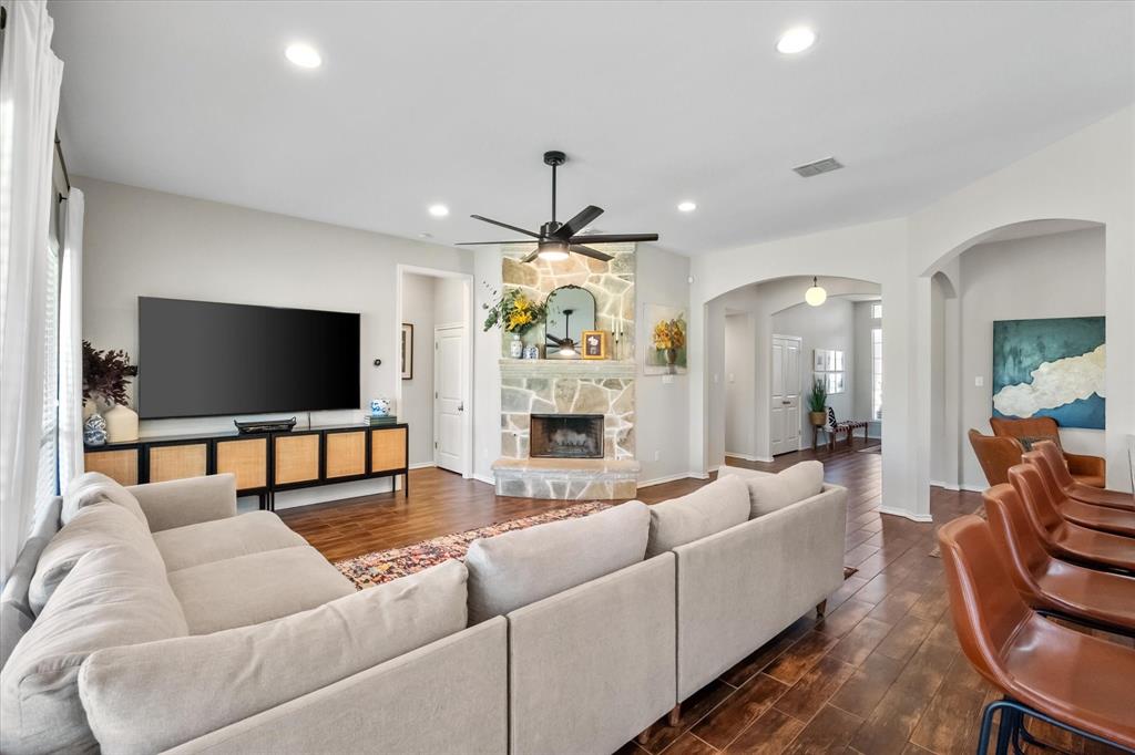 7224 Prestwick Terrace Benbrook, TX 76126 - Photo 10 of 39 a living room with fireplace furniture and a flat screen tv