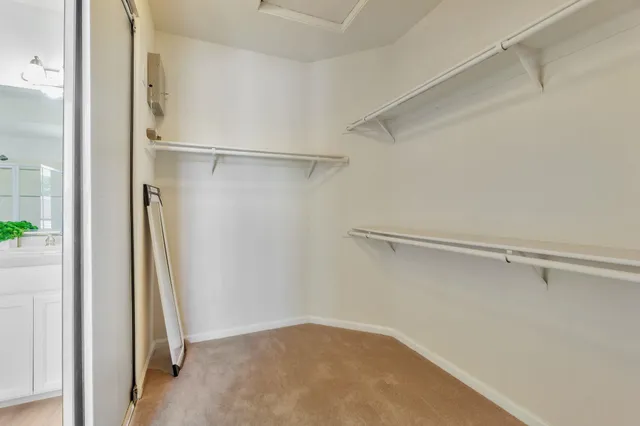 a bathroom with a double vanity sink and mirror
