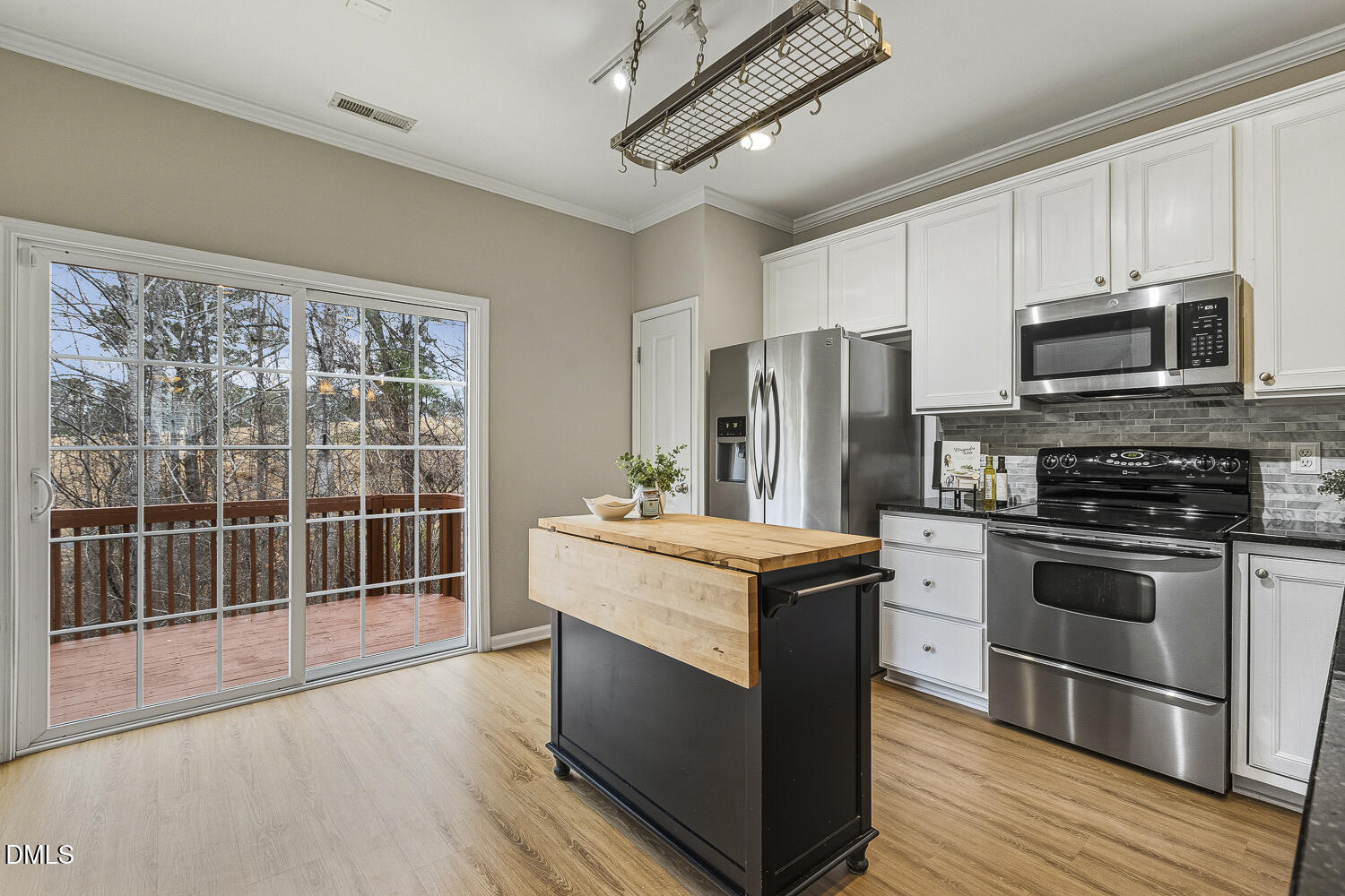 6055 Viking Drive Raleigh, NC 27612 - Photo 6 of 15 Spacious Kitchen