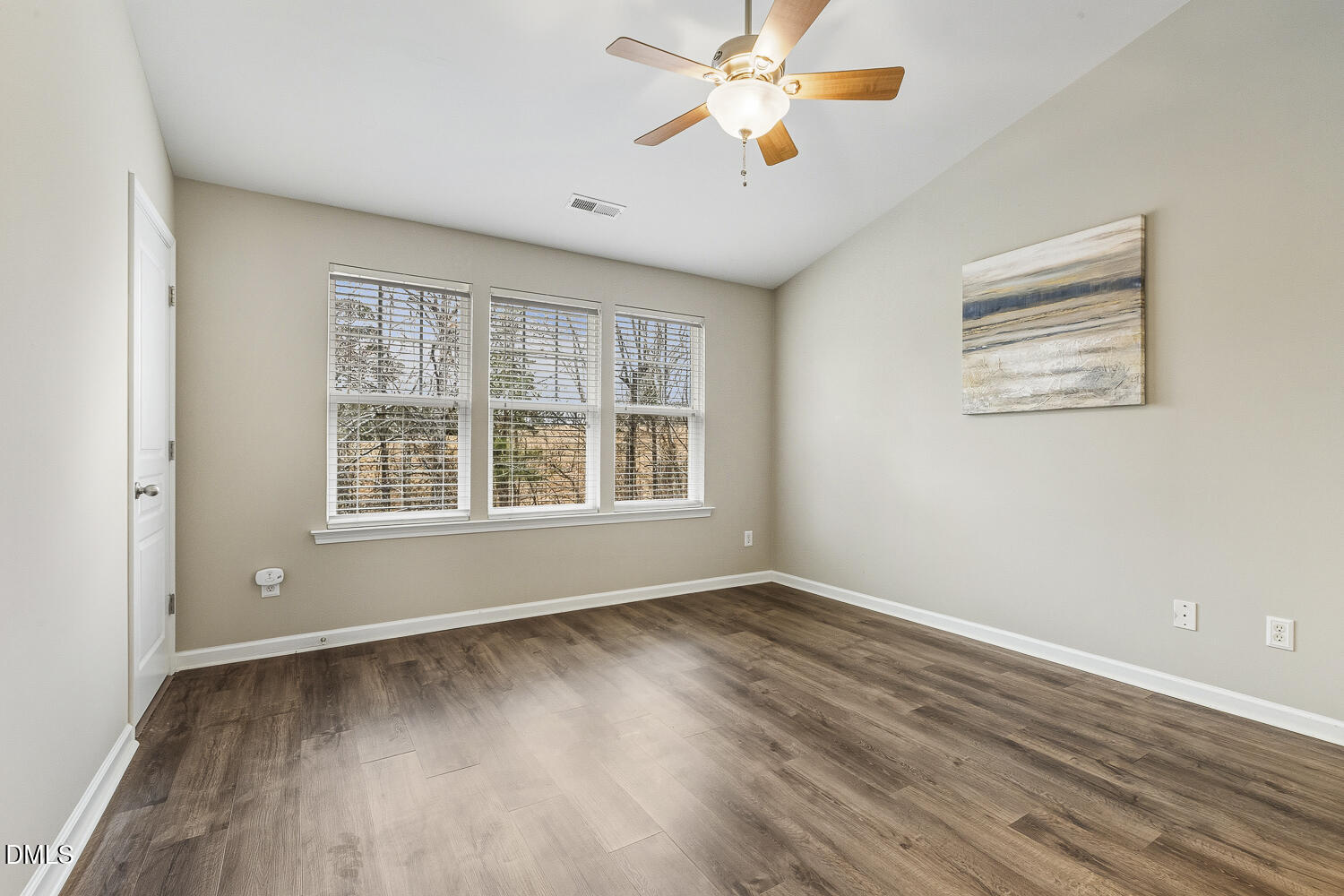 6055 Viking Drive Raleigh, NC 27612 - Photo 9 of 15 Primary Bed w/ Vaulted Ceilings