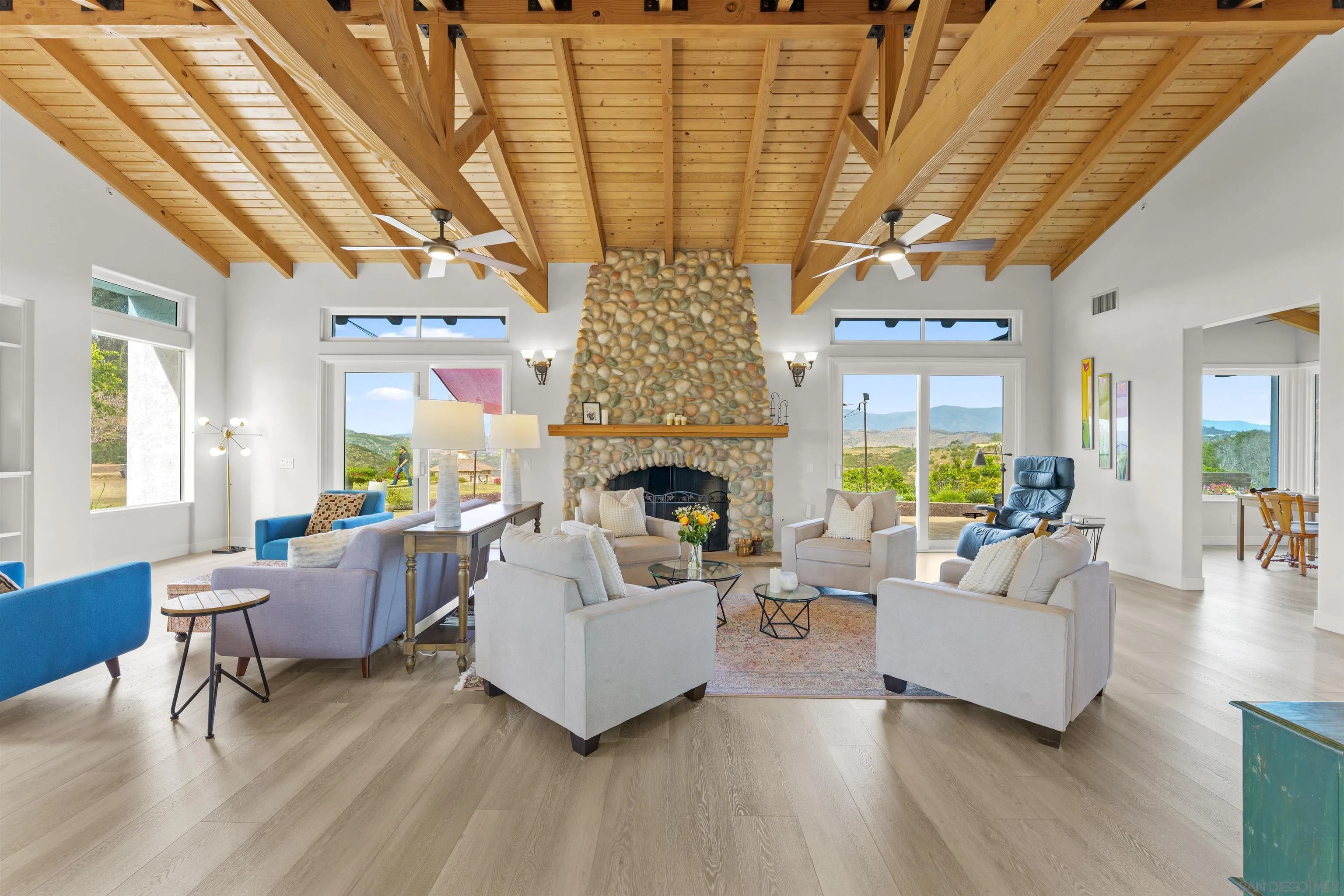 30659 Diaz Road Valley Center, CA 92082 - Photo 8 of 44 a living room with furniture and a fireplace