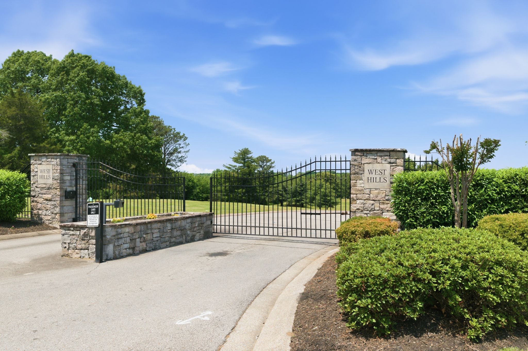 528 Country Club Drive Dickson, TN 37055 - Photo 2 of 55 a view of a pathway with a wrought fence