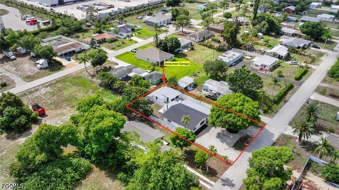 1200 Patterson Road Cape Coral, FL 33909 - Photo 41 of 42 an aerial view of residential houses with outdoor space