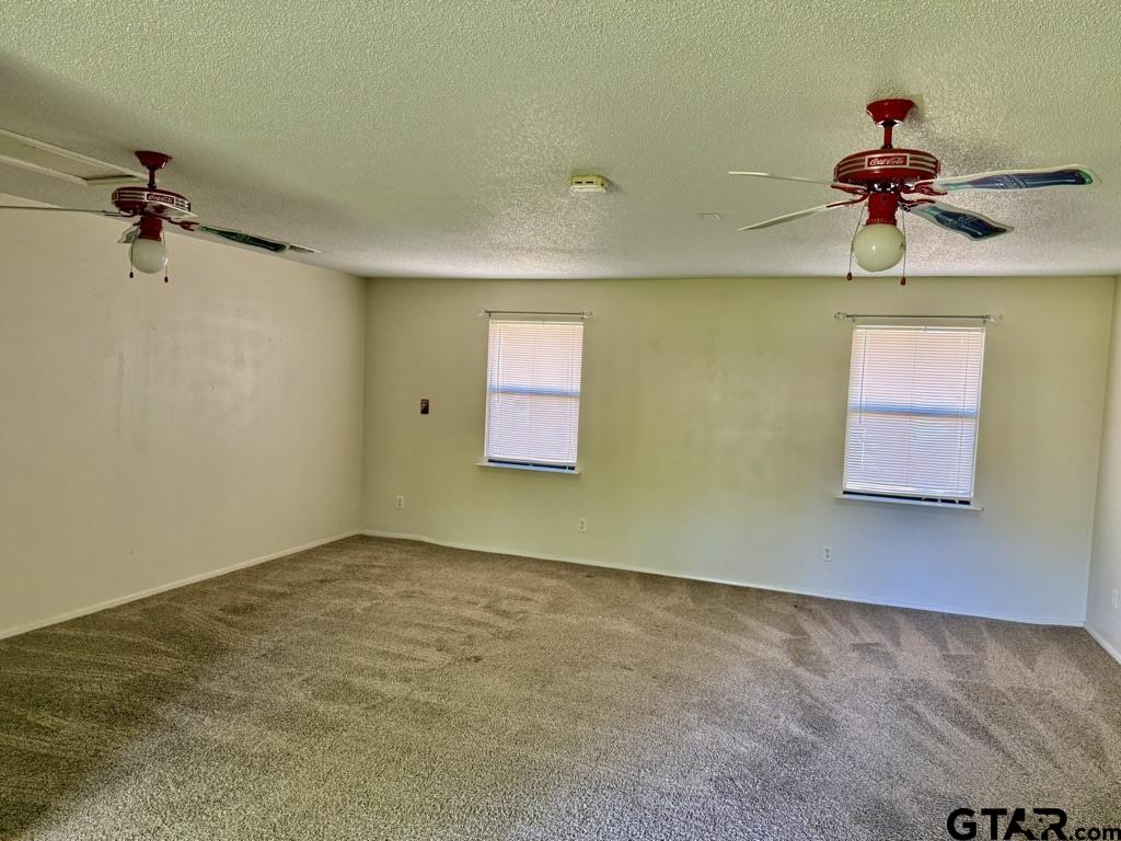 1102 Chad Whitehouse, TX 75791 - Photo 3 of 16 a view of a room with a ceiling fan