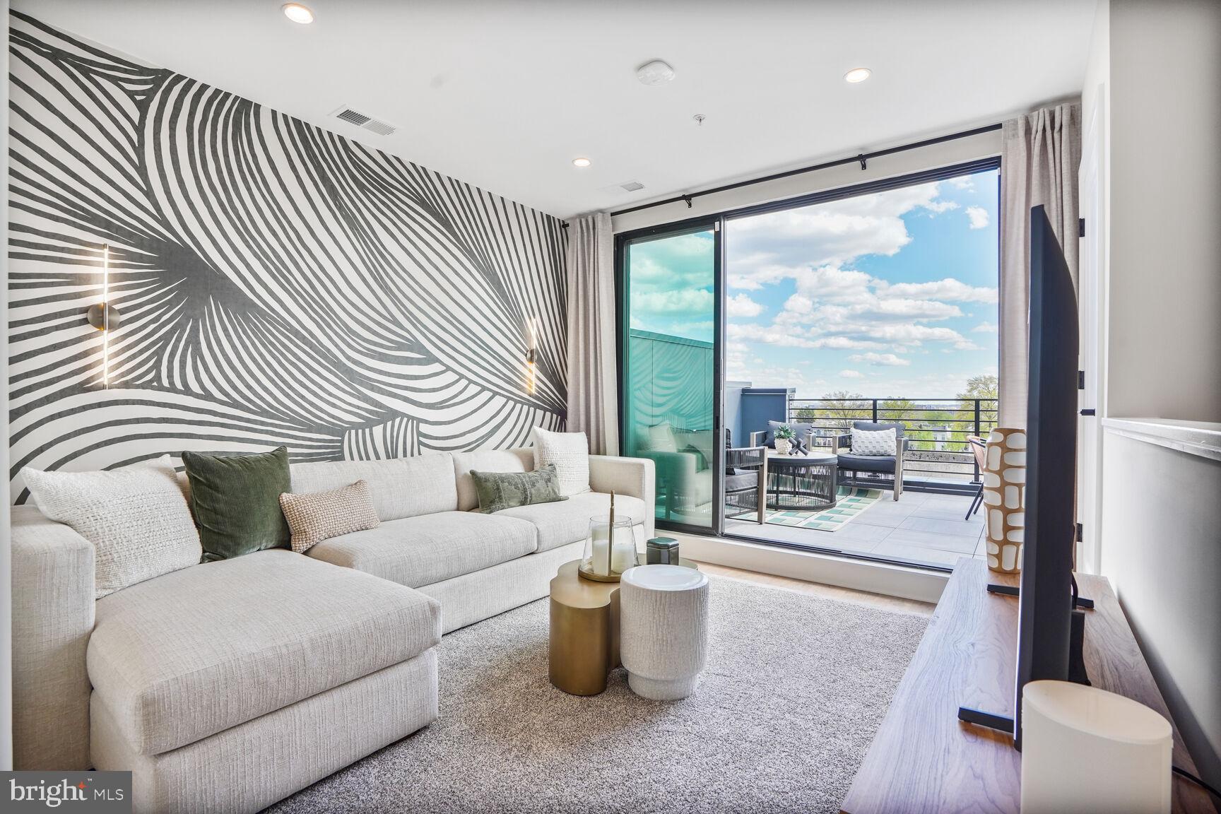 61 Lower Service Court Northwest Washington, DC 20422 - Photo 16 of 21 a living room with furniture and a large window